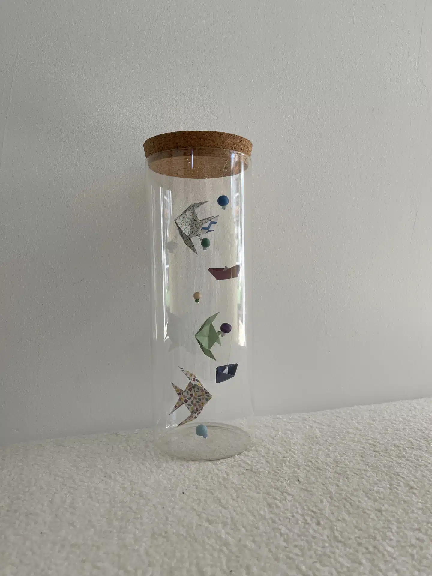 Bocal en verre poissons et bateaux en origami